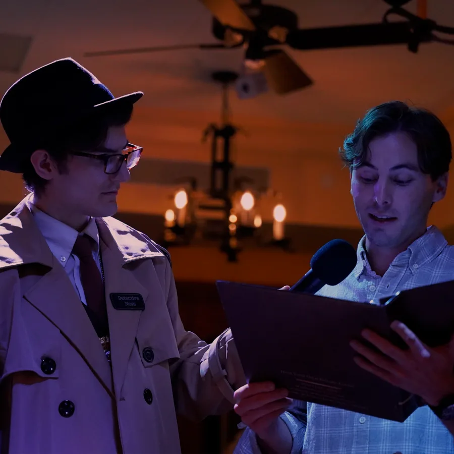 Professional actors performing at a Las Vegas murder mystery